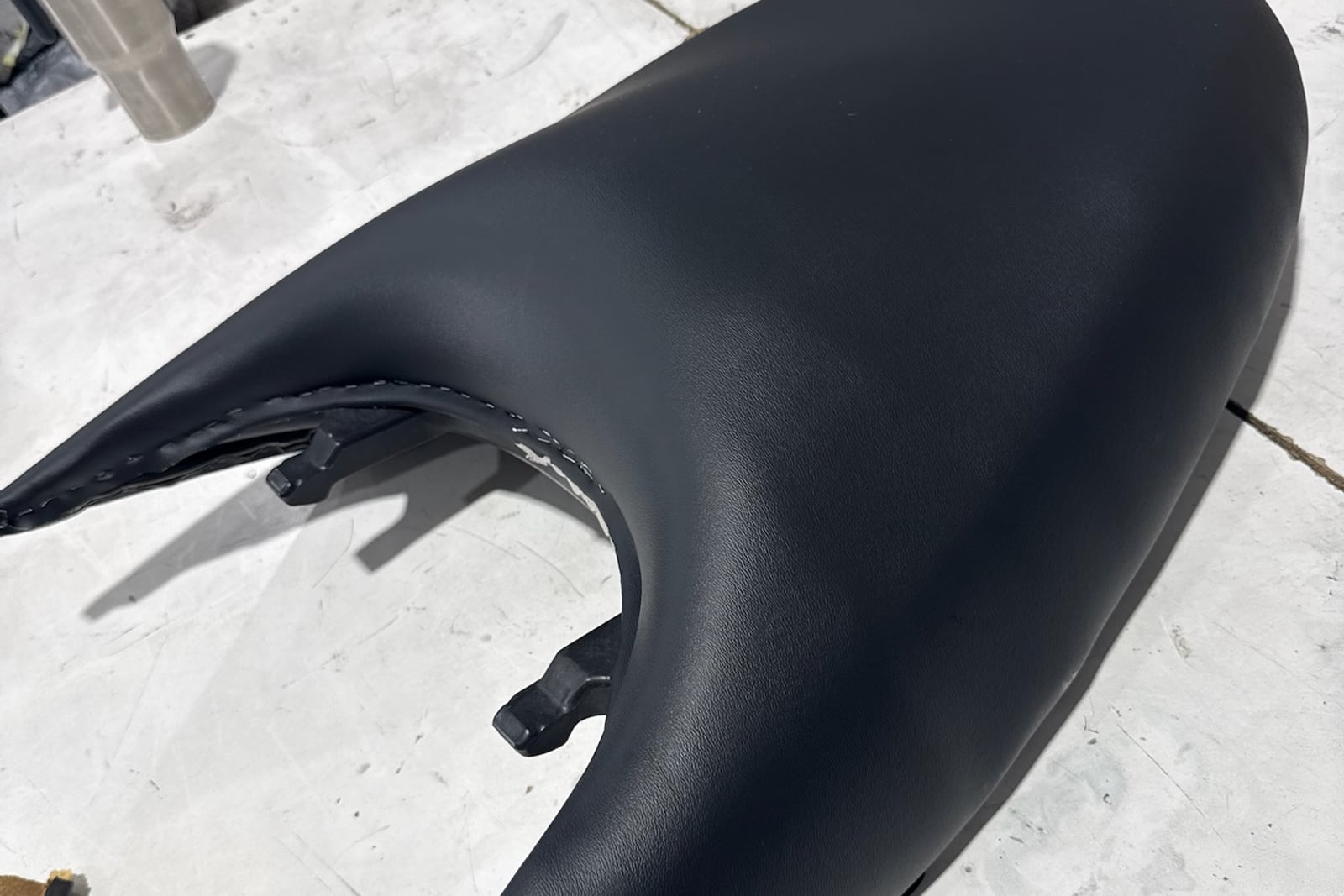 After: Sun-perished jet ski seat — before and after repair by Dr. Vinyl DFW