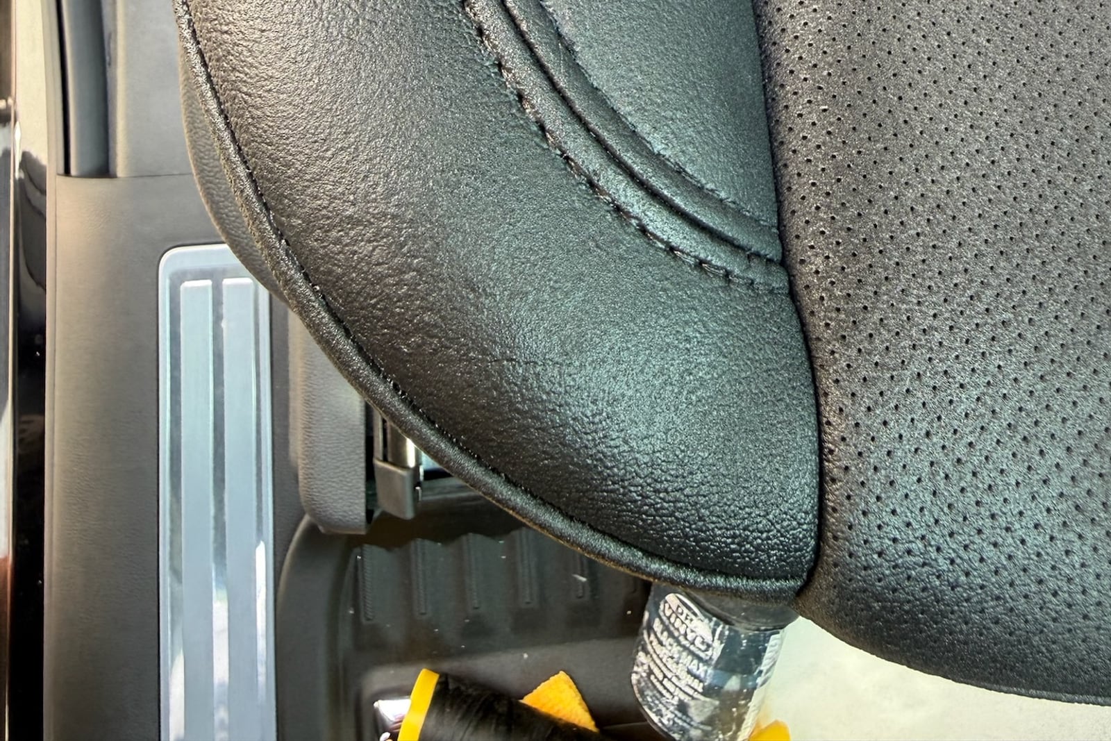 After: Split seam on a leather seat — before and after repair by Dr. Vinyl DFW