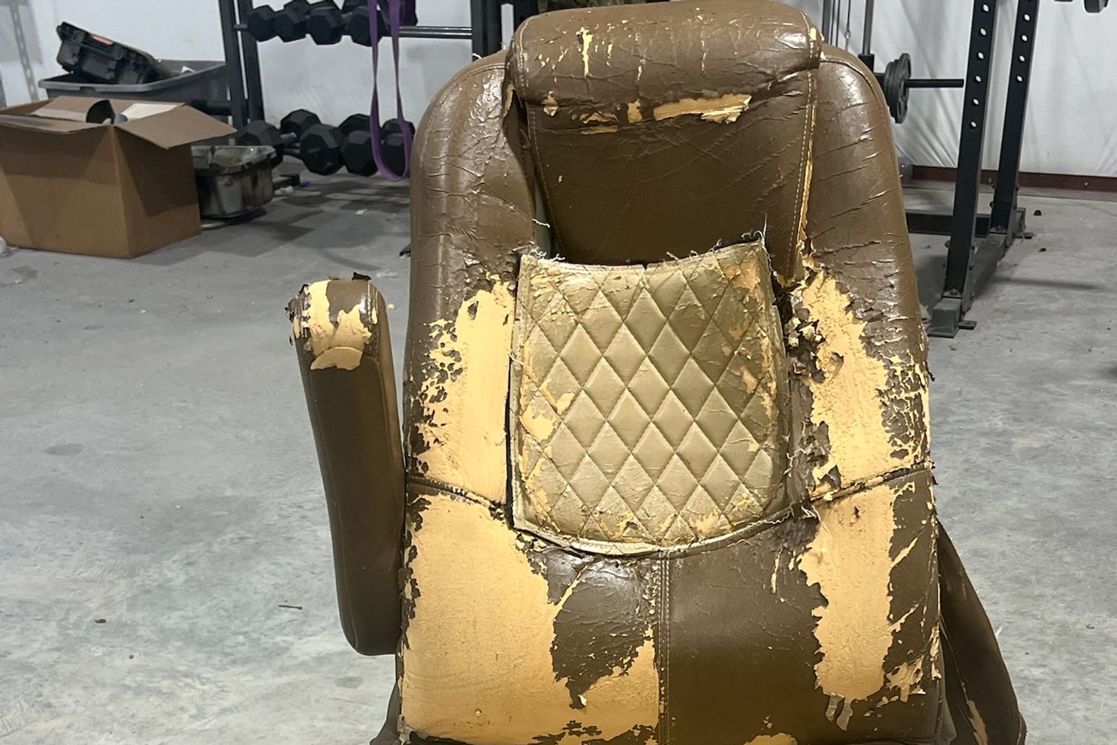 Before: RV captain’s chair — before and after repair by Dr. Vinyl DFW